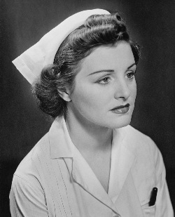 1940s female nurse in a traditional nurse uniform