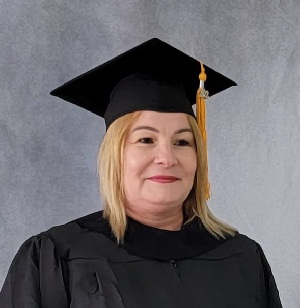 Anontia Alonso Fajardo in her South University cap and gown