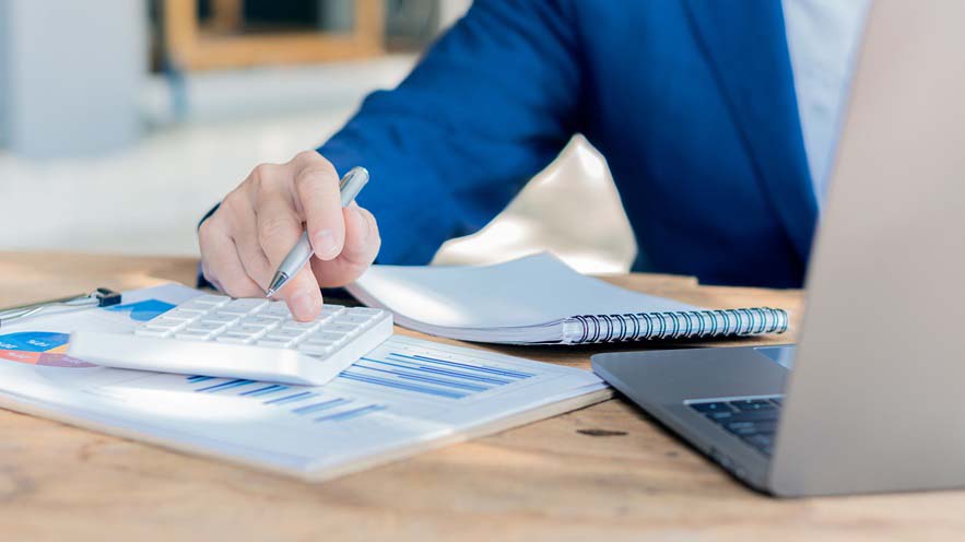 Person calculating costs