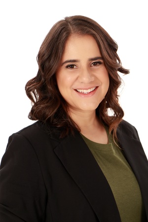 Diana Huambachano headshot in a black jacket